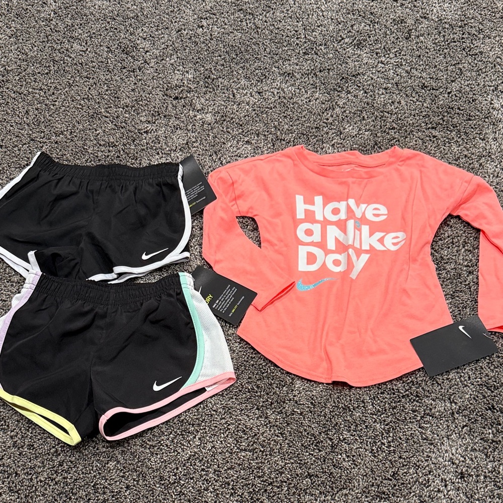 Nike long sleeve top and 2 pairs of shorts. Size 2t. NWT
